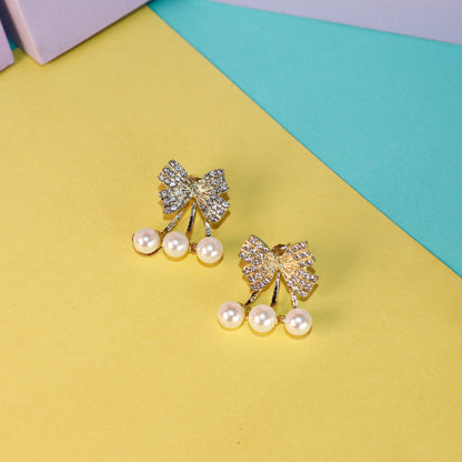 Glistening Pearl Bows Earrings